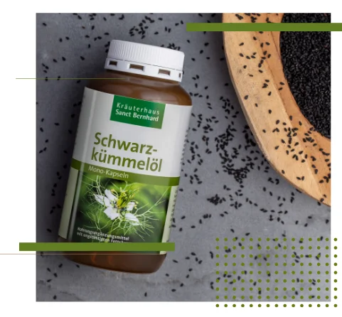 Produktbild Schwarzkümmelölkapseln in einem schönen Arrangement.