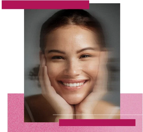 Eine Frau mit strahlender Haut lacht